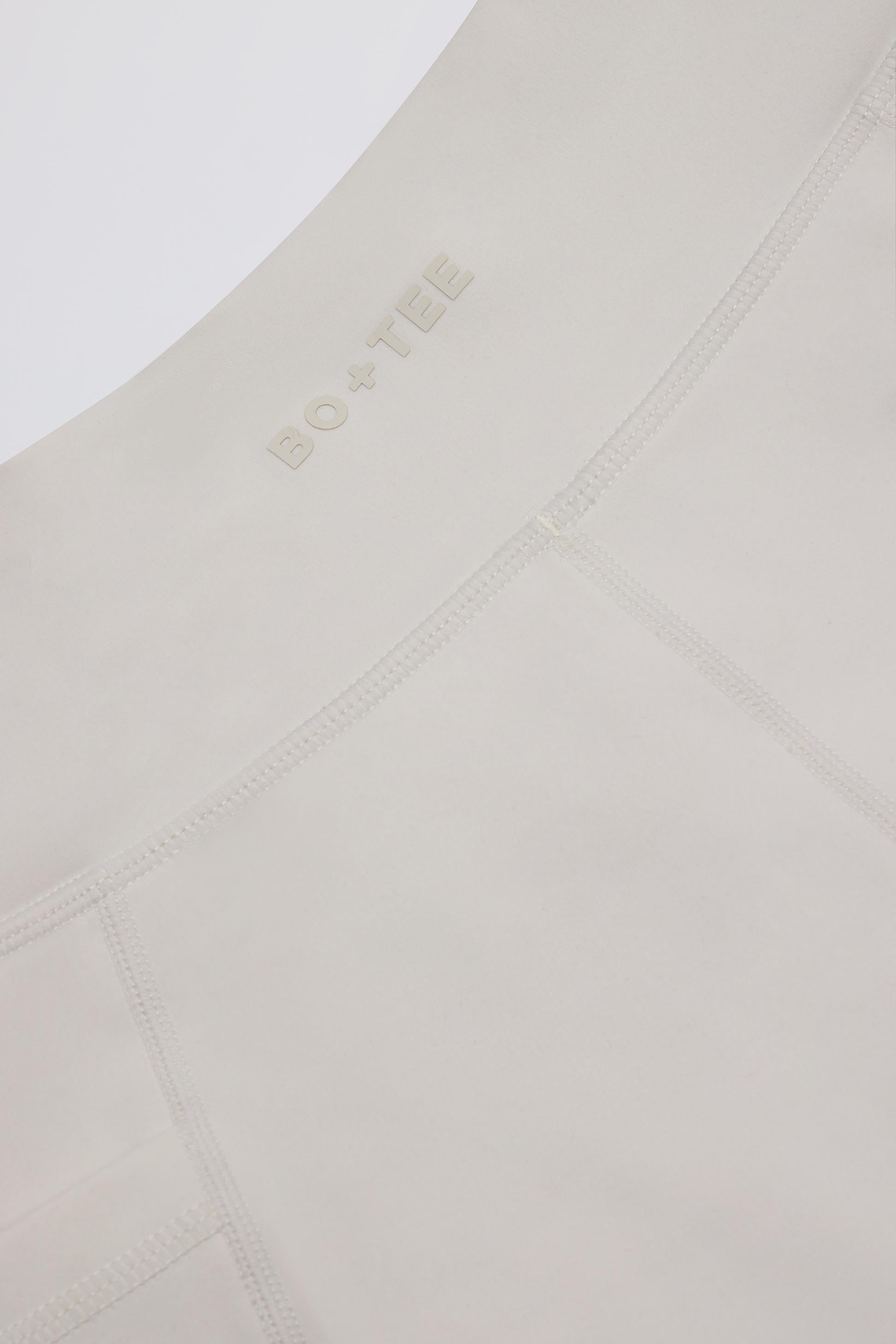 Soft Active Pocket V-waist Mini Shorts In Oat